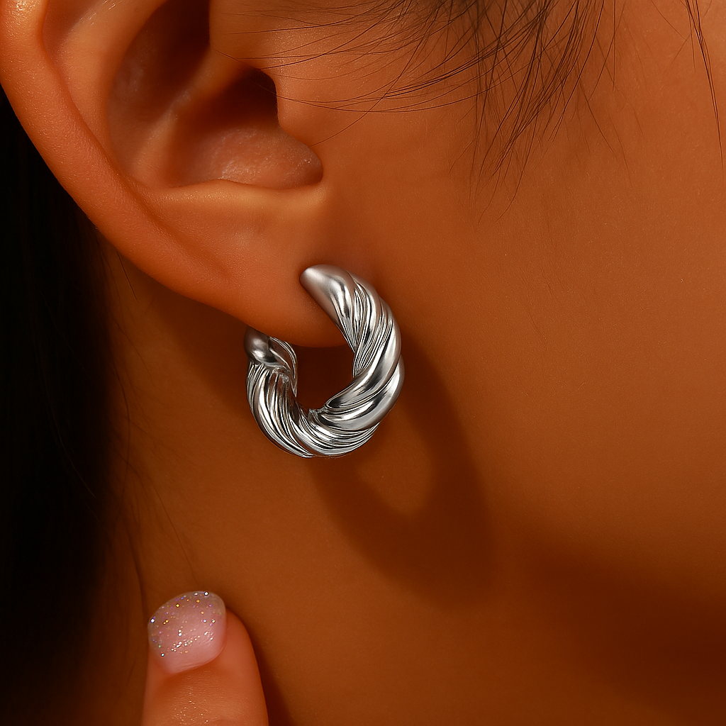 Orecchini intrecciati 18K